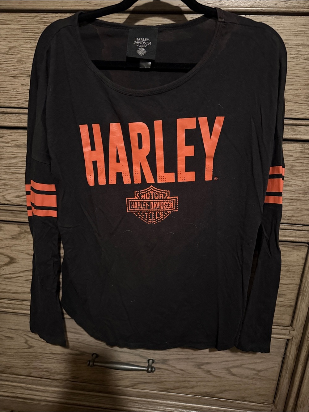 Harley-Davidson Black Long-Sleeve Top with Orange Logo and Sleeve Stripes